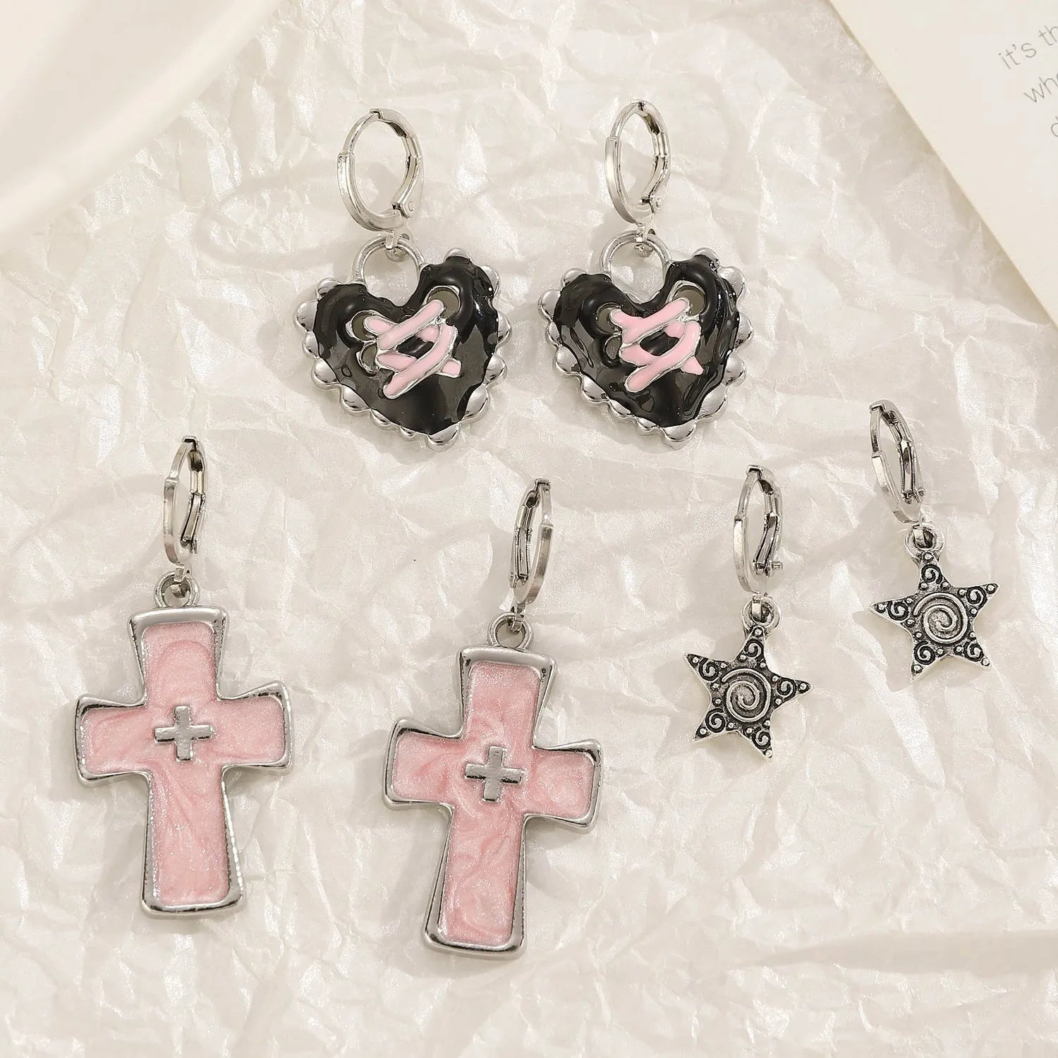 Women's alloy earrings with cross crystal design in five colour options including white, black cat, and antique silver