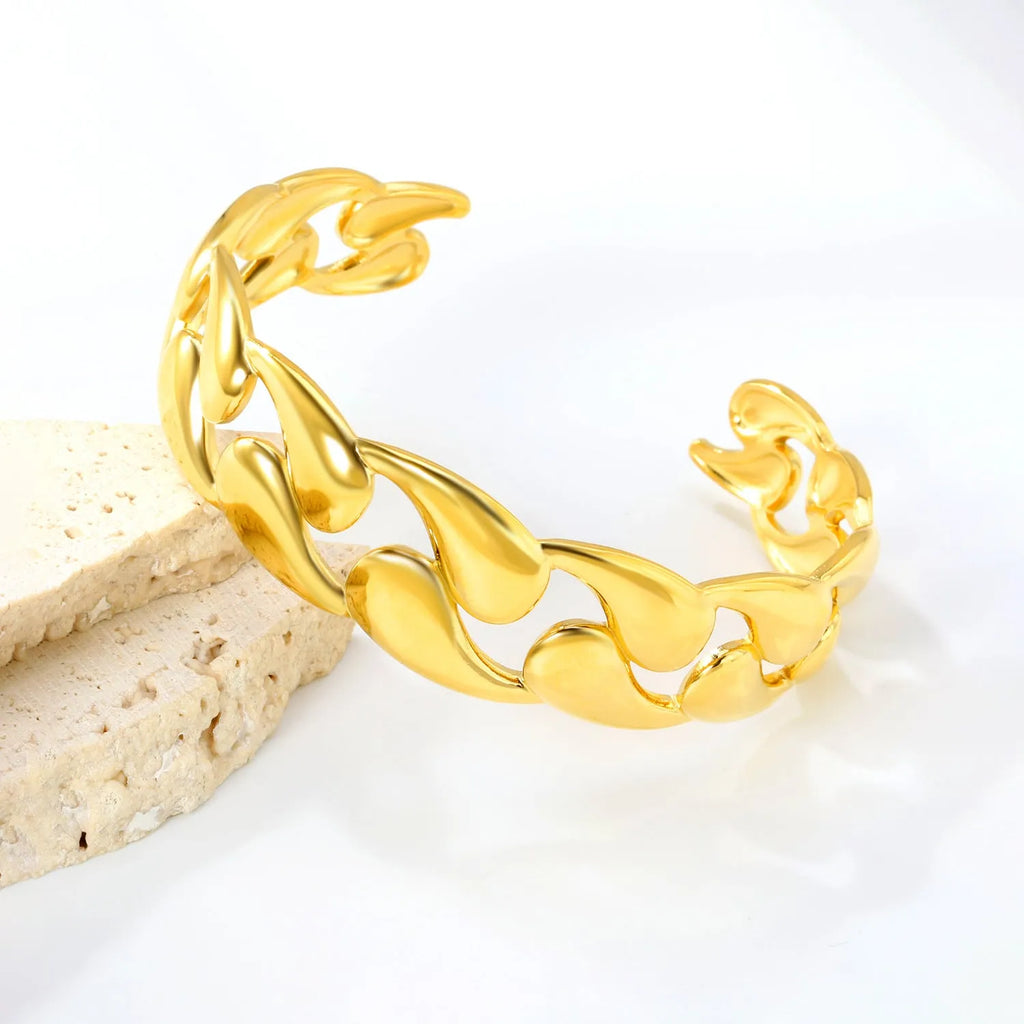 Stainless steel luxury-inspired bracelet in silver, gold, and two-tone colour options