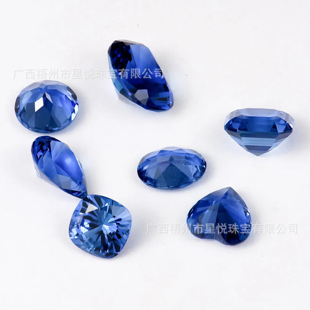 Royal blue loose gemstones showing heart shape cut in various carat weights