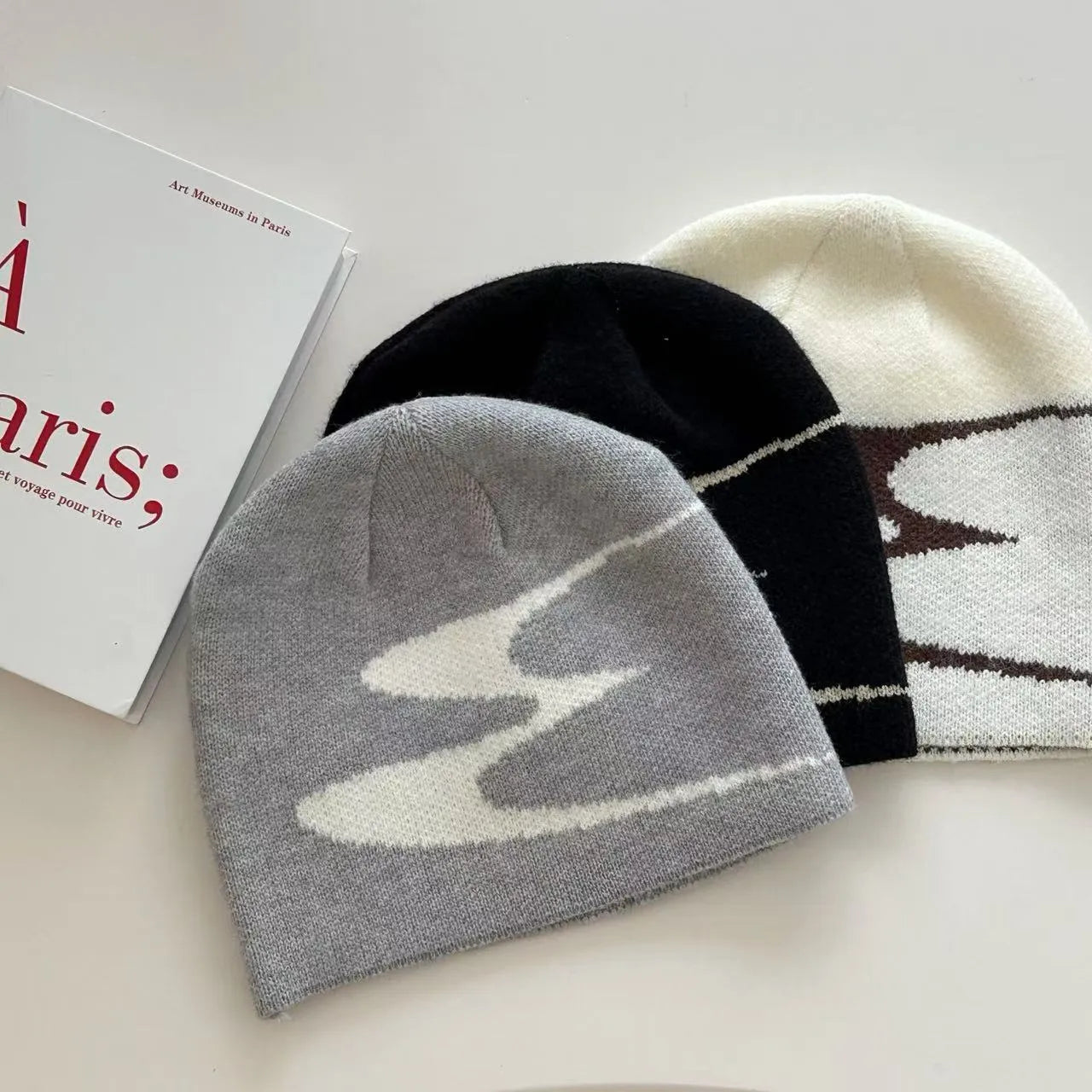 Acrylic knitted beanie hat for men and women in black, grey, or white, size M 56-58cm