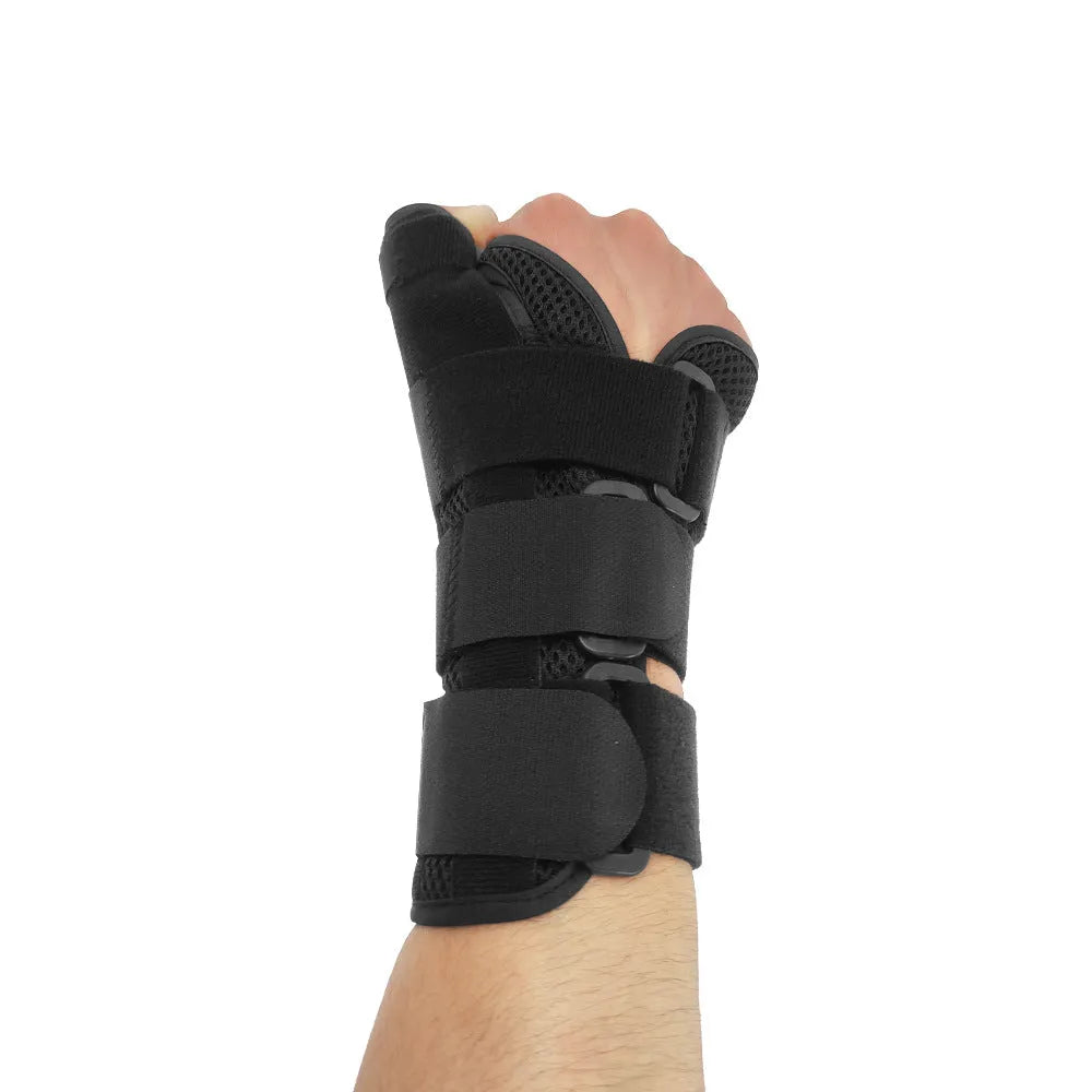 Carbon fibre sports wrist guard with thumb strap in black and grey