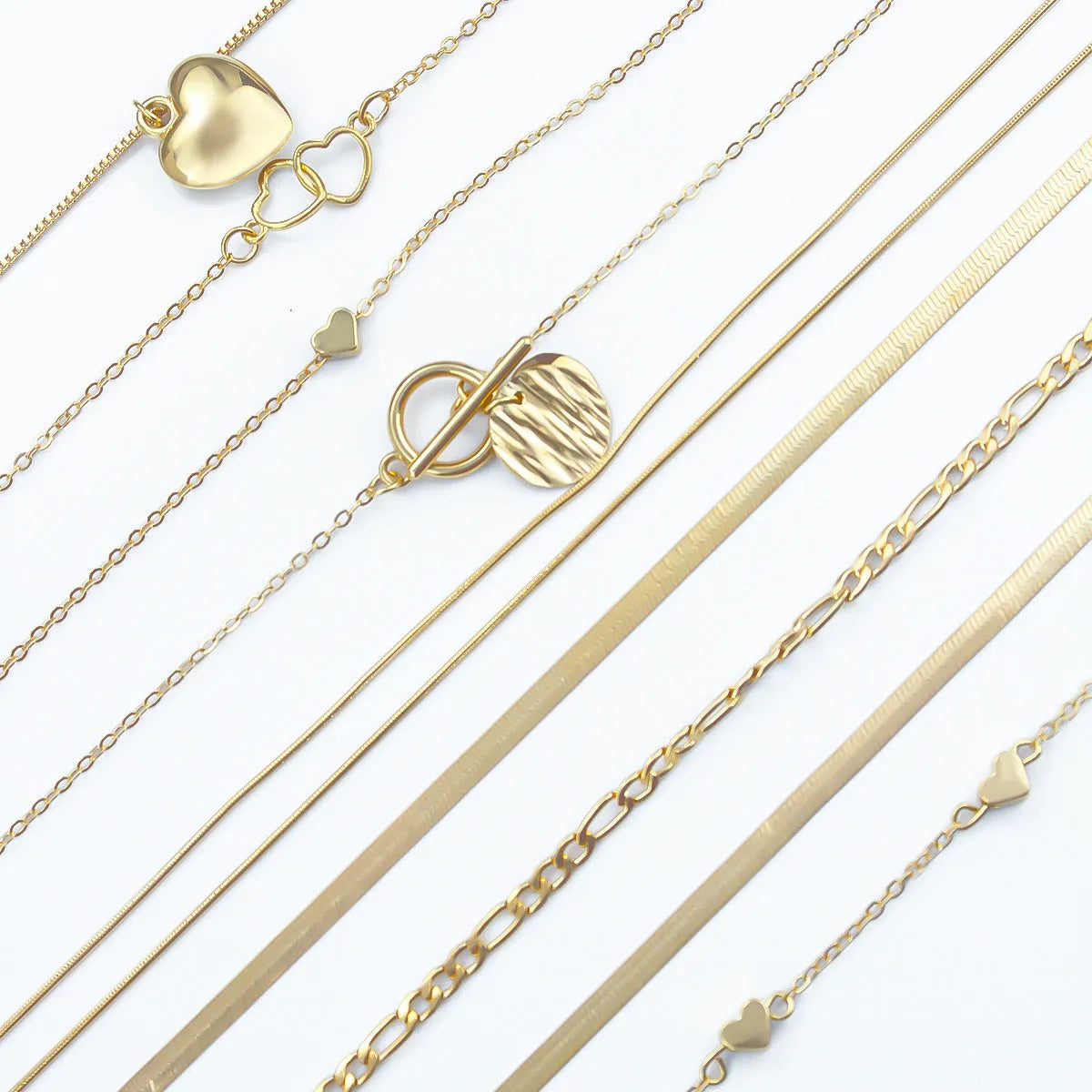 10-piece women's jewellery set with gold necklace featuring alloy pendant on snake bones chain