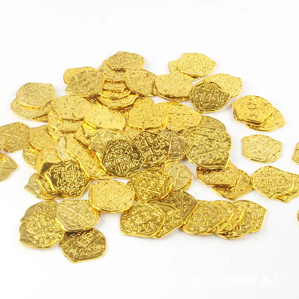 A pile of gold, silver, and bronze plastic Roman coin replicas from a 100-piece set.