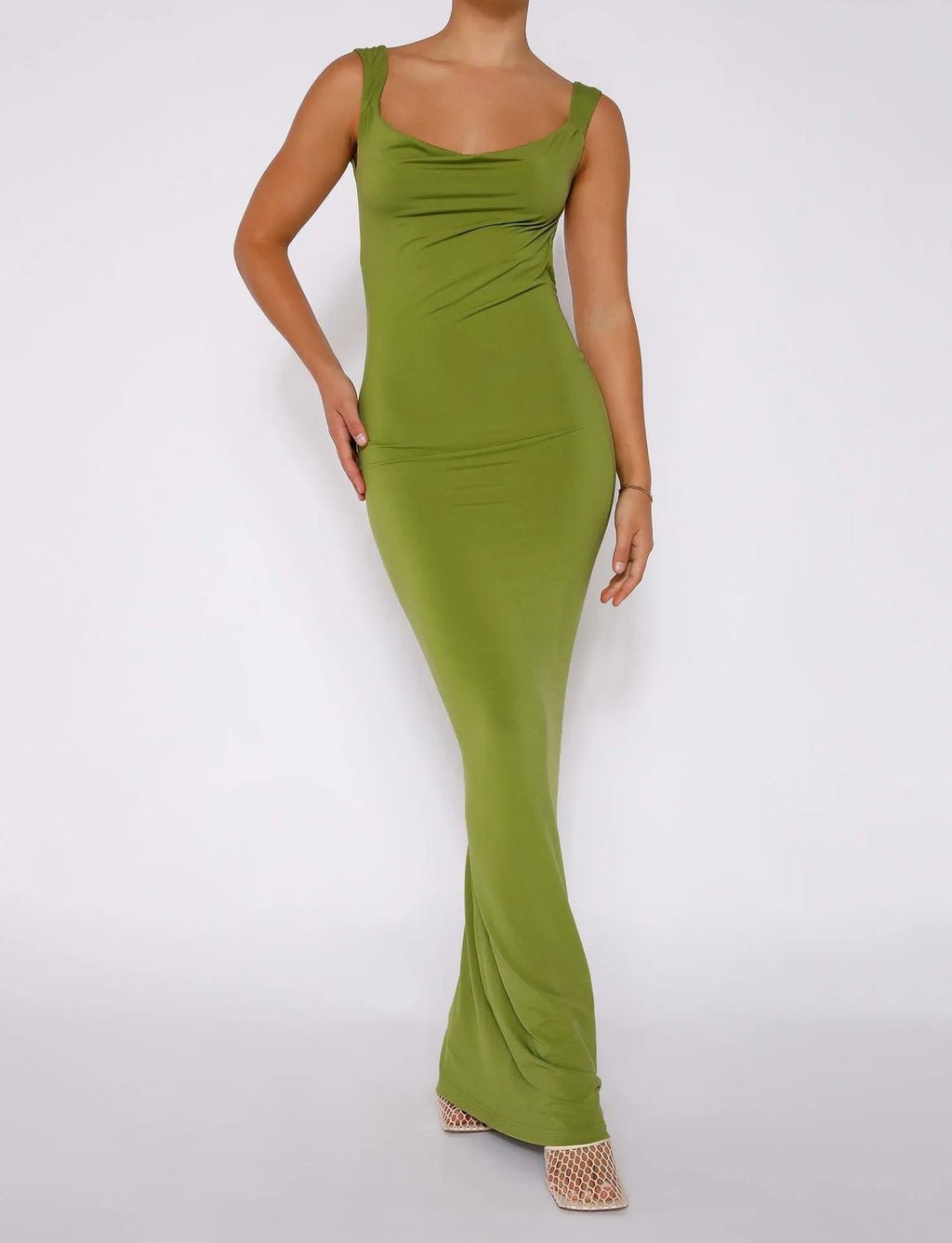 Backless milk silk dress with spaghetti straps and high waist hip skirt in champagne colour
