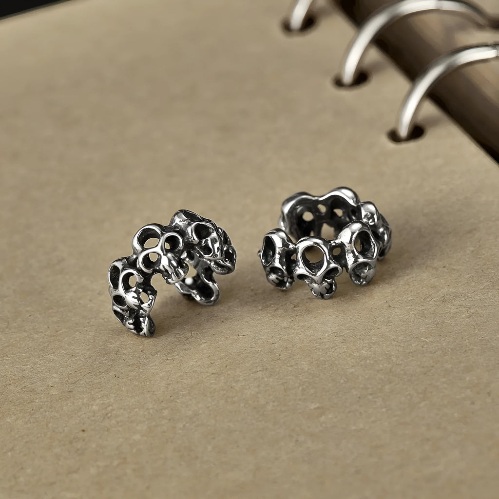 Stainless steel geometric skull ear clips with hollow design and electroplated finish