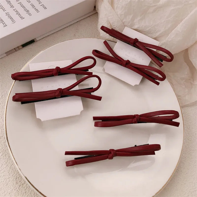 Wine red leather bow hair barrettes clip for women in advanced style
