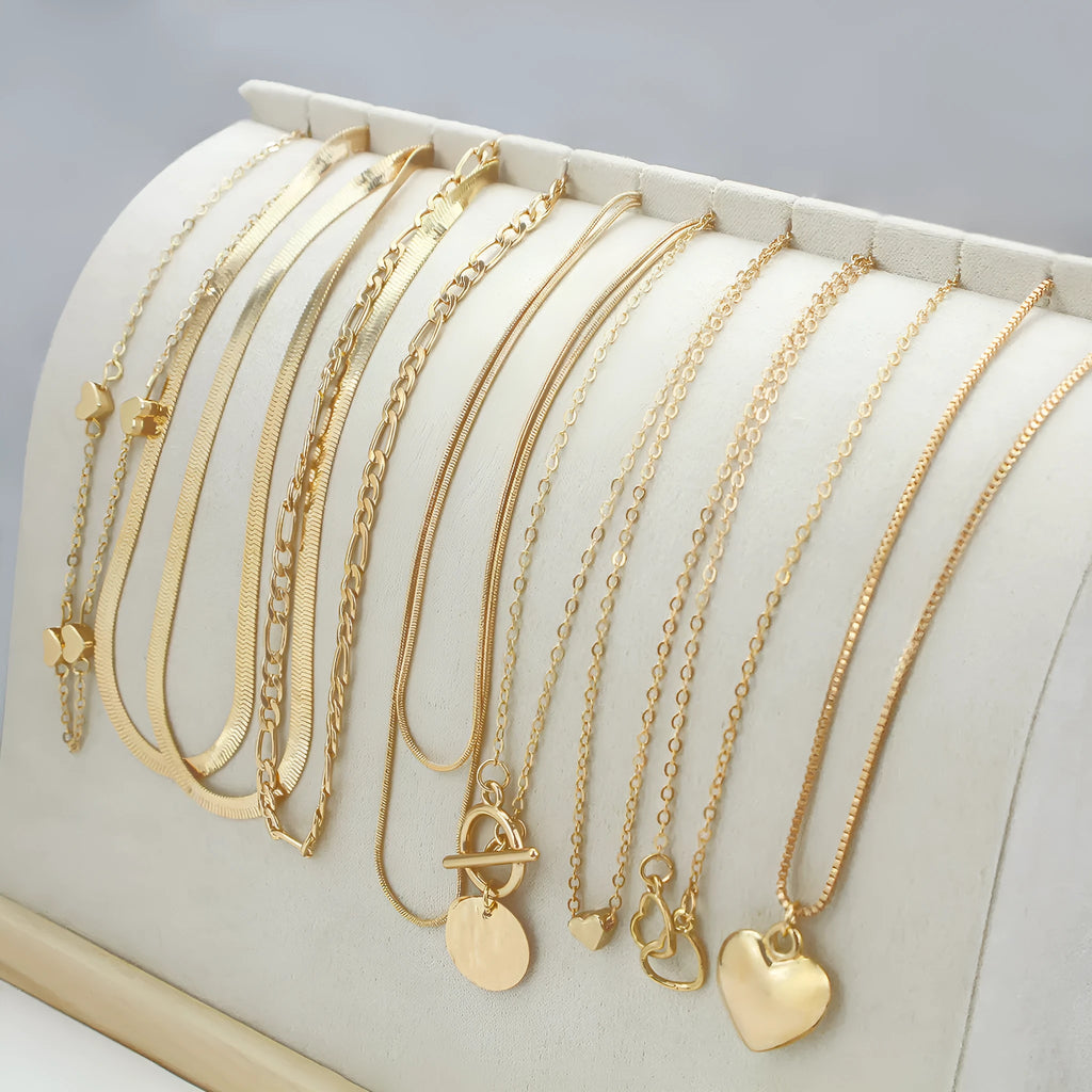 10-piece women's jewellery set with gold necklace featuring alloy pendant on snake bones chain