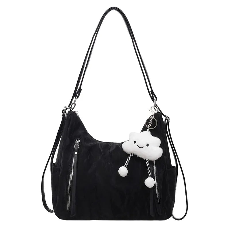 Women's PU leather fashion backpack in beige, black, blue, or silver with pendant accessory