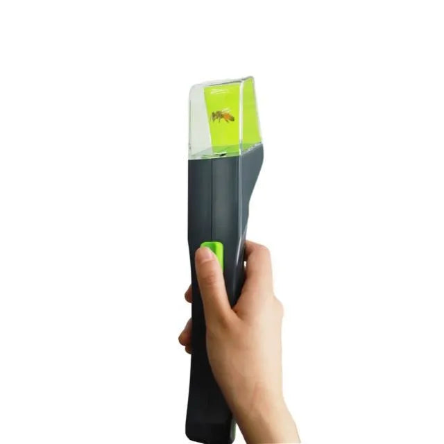 Green handheld insect catcher for garden pest control with plastic construction