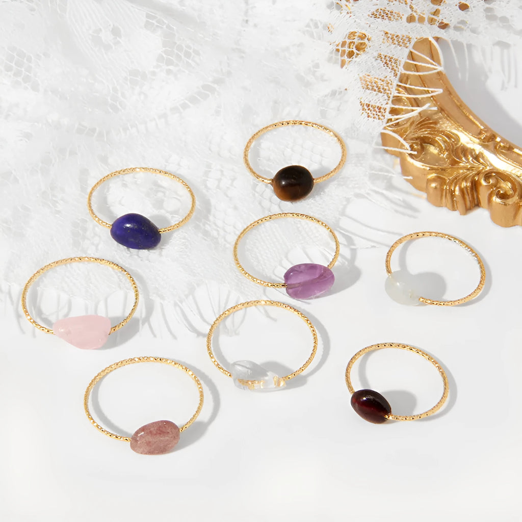 Geometric-shaped agate stone ring for women in various colour options on a neutral background.