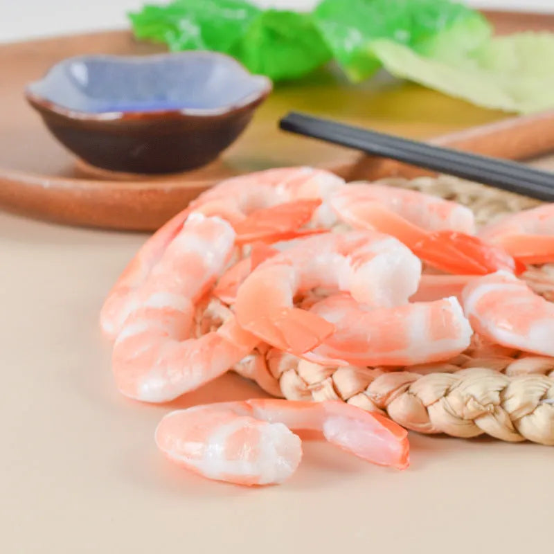 PVC simulation shrimp keychain on a key ring, showing its 1.5cm thickness and modern design.