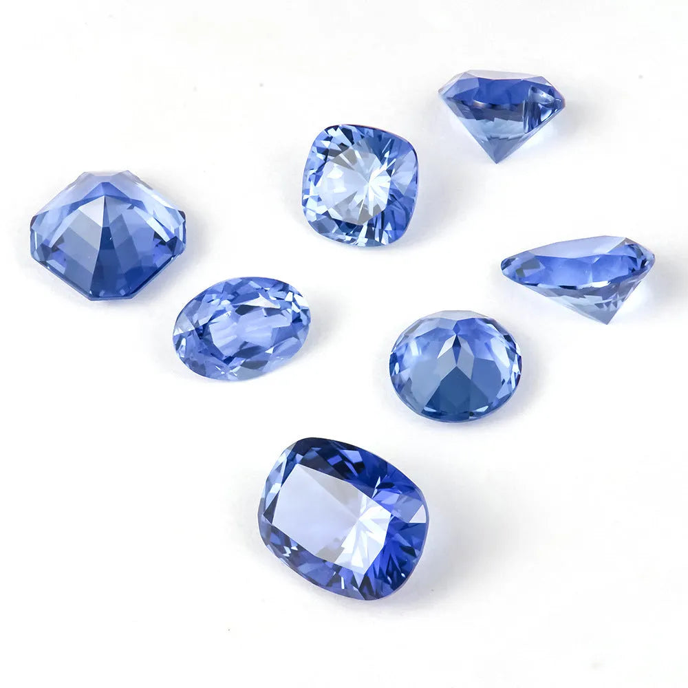 Royal blue loose gemstones showing heart shape cut in various carat weights
