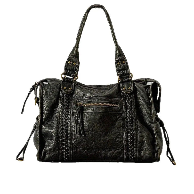 Women's retro motorcycle shoulder bag in bright black with golden edge or brown, showing internal compartments and slit pockets