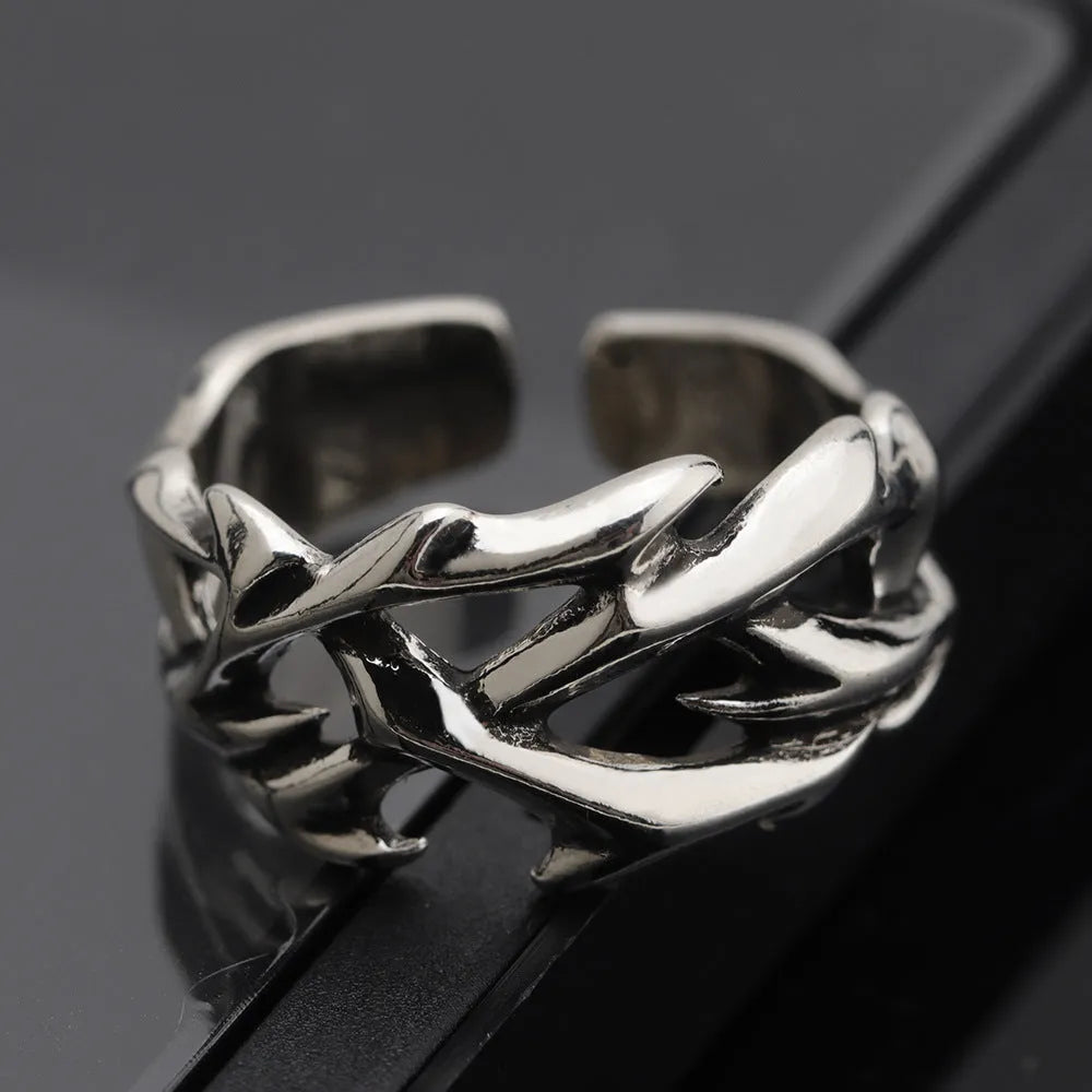 Copper adjustable ring with geometric thorn and flower design in J2150 colour