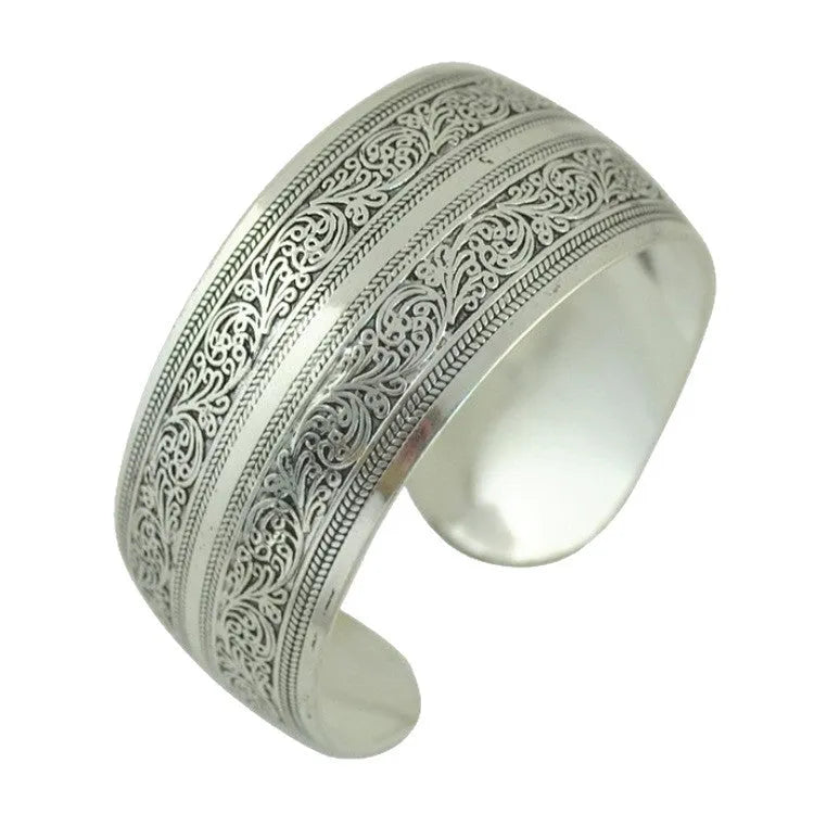 Silver alloy ethnic bracelet with carved Miao openwork patterns in turtle colour option
