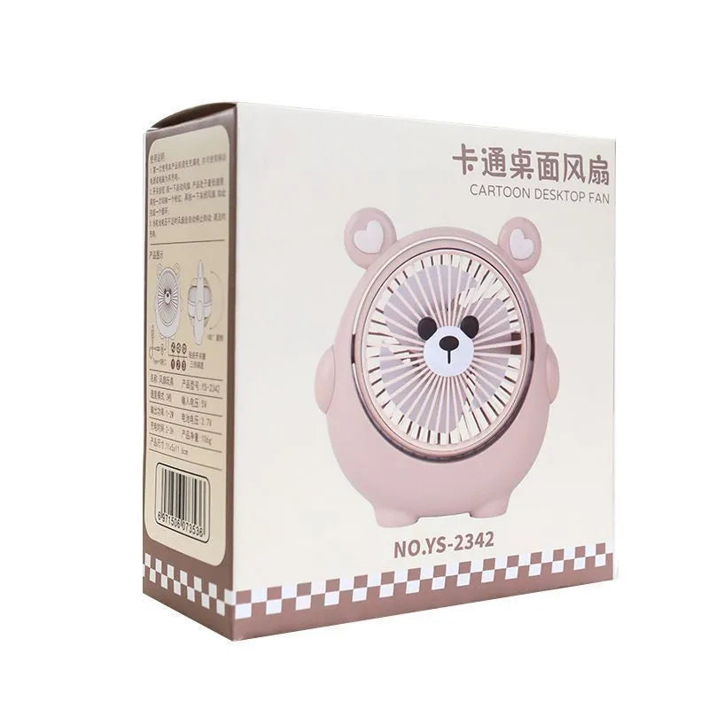 Cute dog-themed USB desktop electric fan in a choice of six colours on a wooden desk.