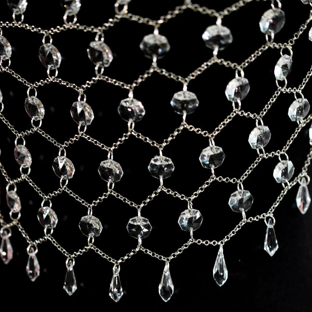 Hand-woven transparent acrylic crystal sequins body chain chest necklace in round shape on display