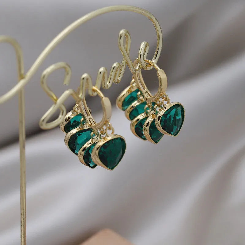 Green heart-shaped Korean style ear clip earrings with alloy gemstone detail on copper