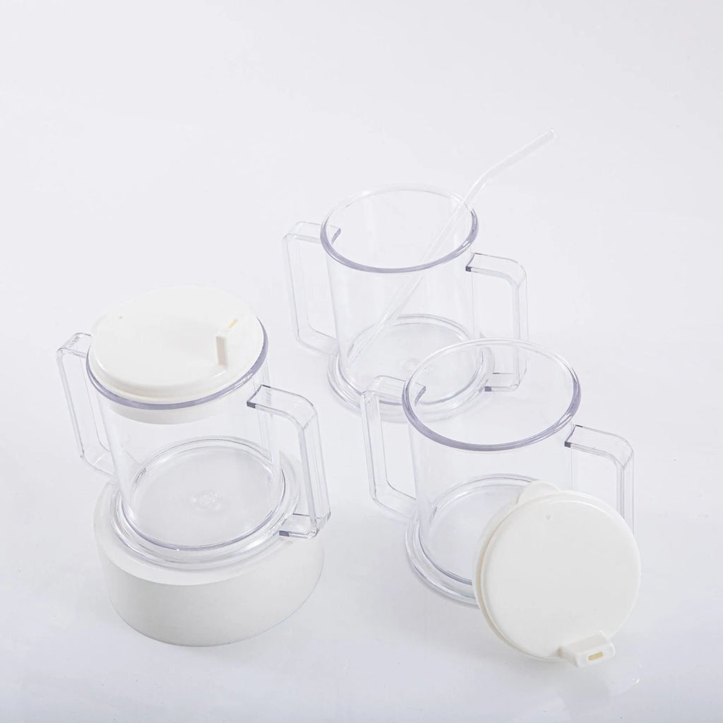 Transparent spill-proof drinking cup with lid on white background