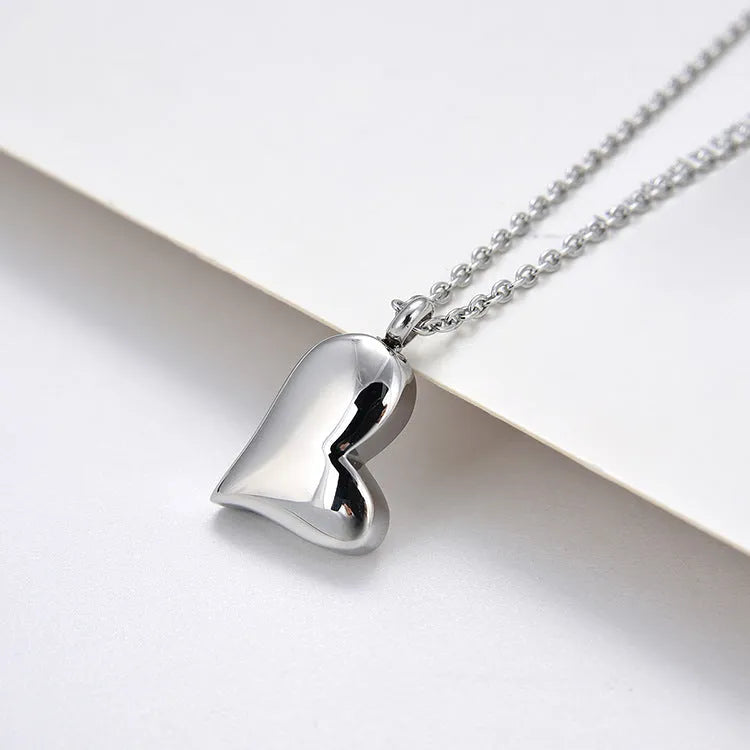 Silver stainless steel curved peach heart pendant necklace with adjustable chain