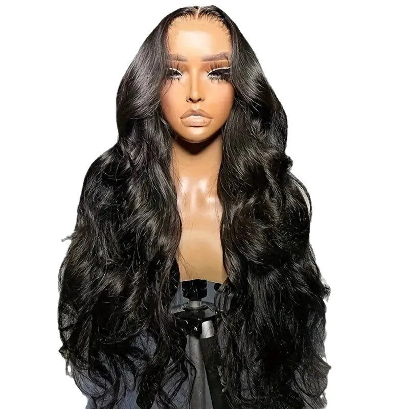 Black synthetic ladies wig with big wavy hairstyle on a mannequin head, showing lace fibre construction.