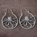 A pair of vintage-style octopus-shaped earrings in an antique silver colour.