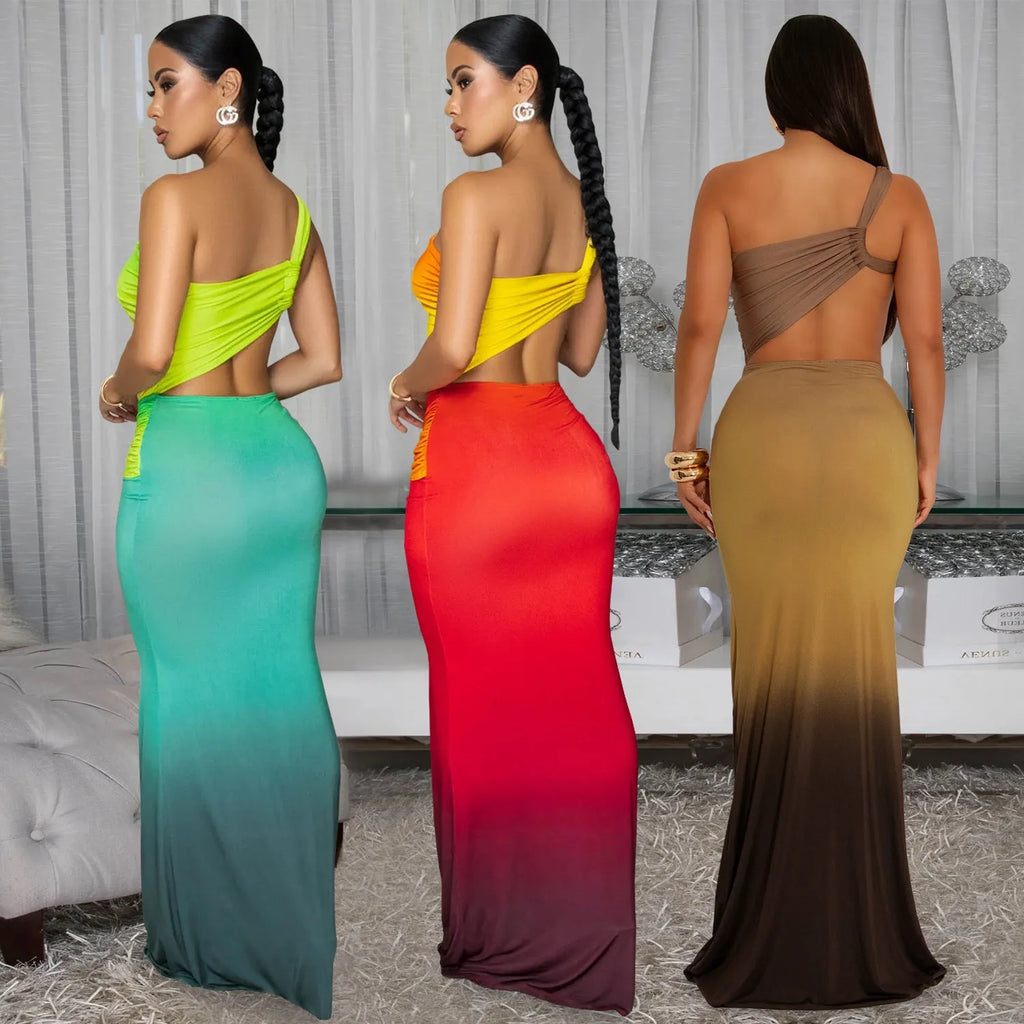 Women's long gradient colour dress with an asymmetric cross-shoulder neckline and sleeveless design.