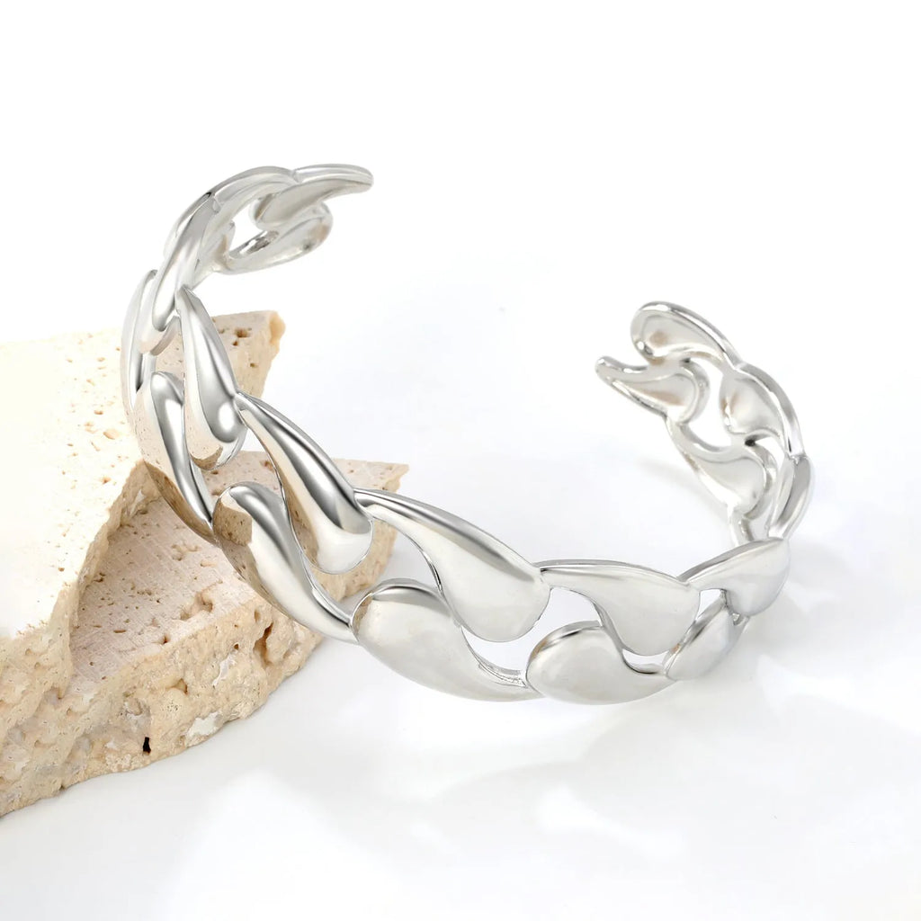 Stainless steel luxury-inspired bracelet in silver, gold, and two-tone colour options
