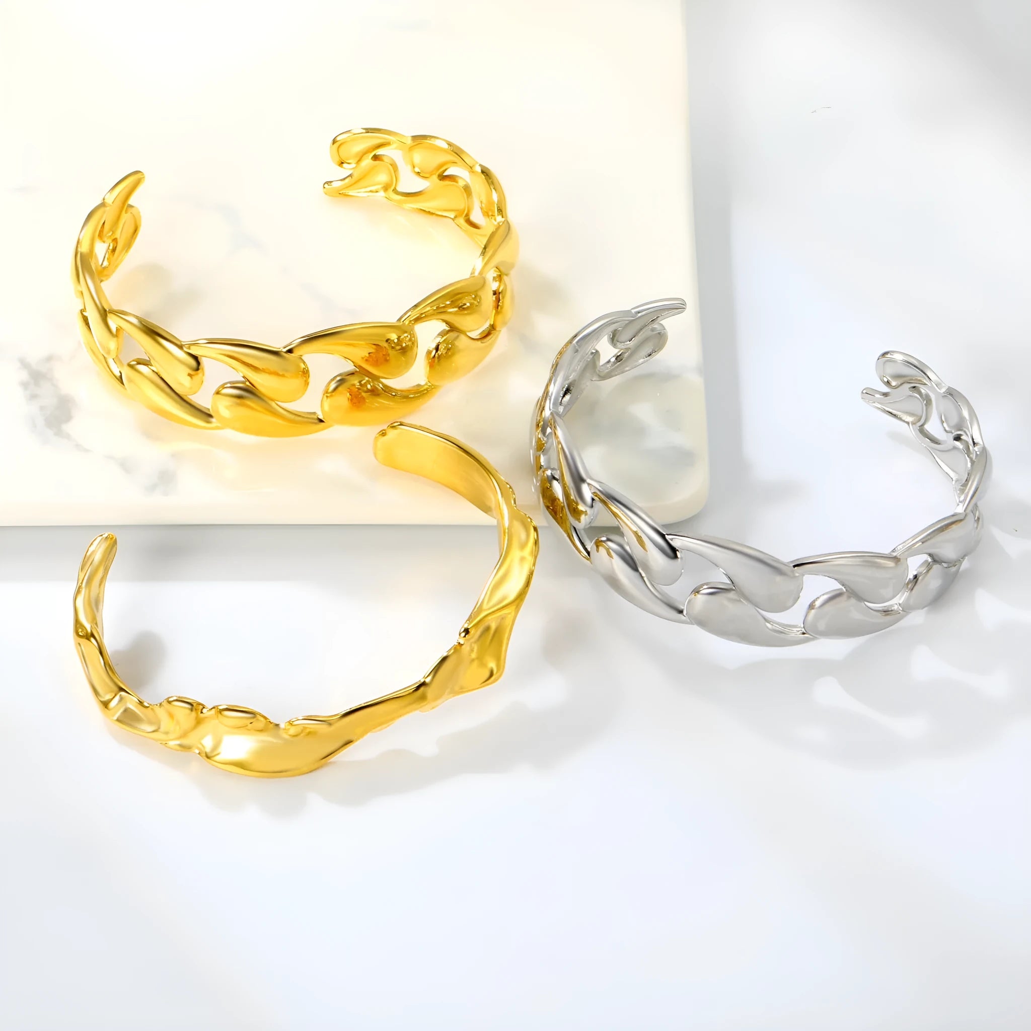 Stainless steel luxury-inspired bracelet in silver, gold, and two-tone colour options