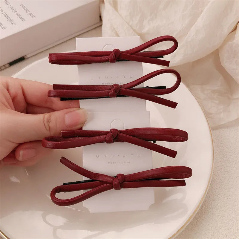 Wine red leather bow hair barrettes clip for women in advanced style