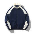 Men's black casual jacket with contrast stitching detail and side pockets, shown in loose fit for spring and autumn wear