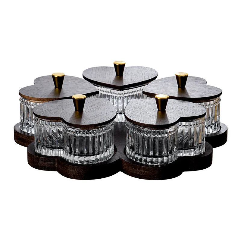 Glass fruit platter with transparent heart-shaped lids in compartmentalised serving tray