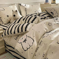 Cartoon dog pattern cotton bedding four-piece set showing quilt cover and sheets