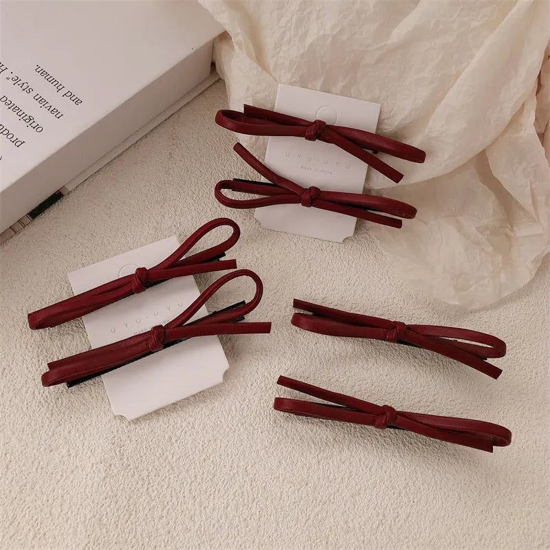 Wine red leather bow hair barrettes clip for women in advanced style