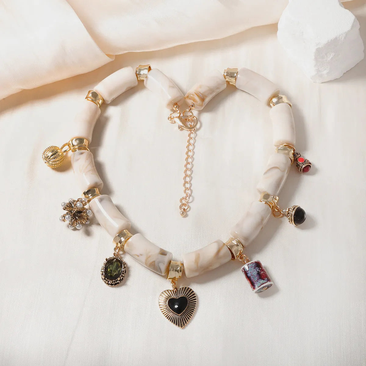 Heart shaped resin bamboo pendant necklace with electroplated finish for women