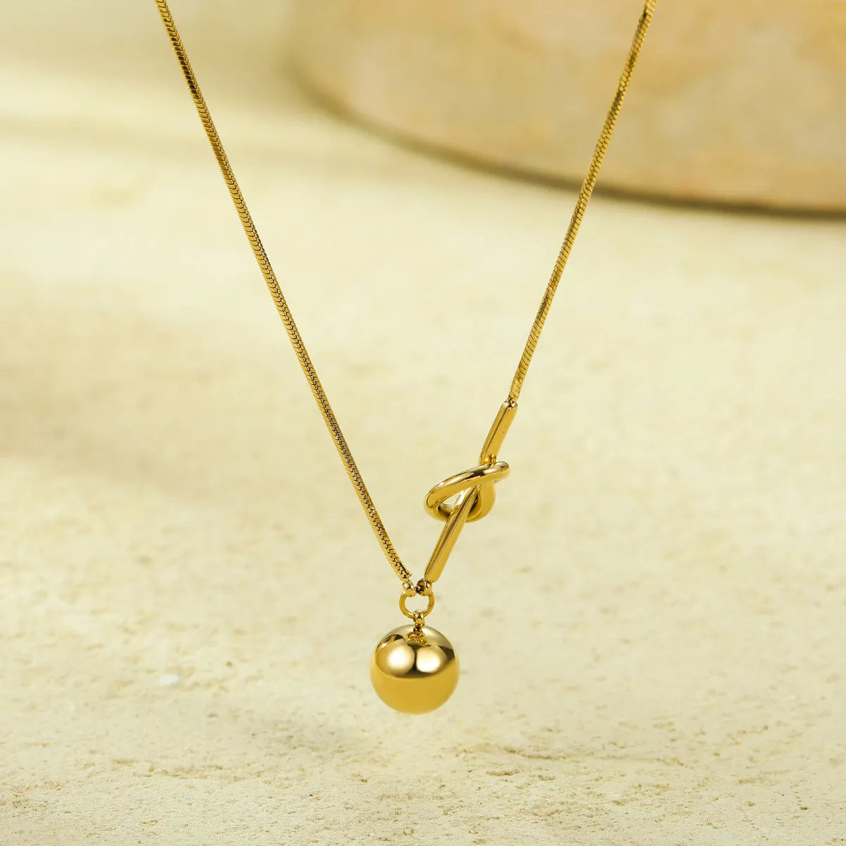 Stainless steel 18K electroplated winding ball pendant necklace with alloy chain for women, fashion OL style