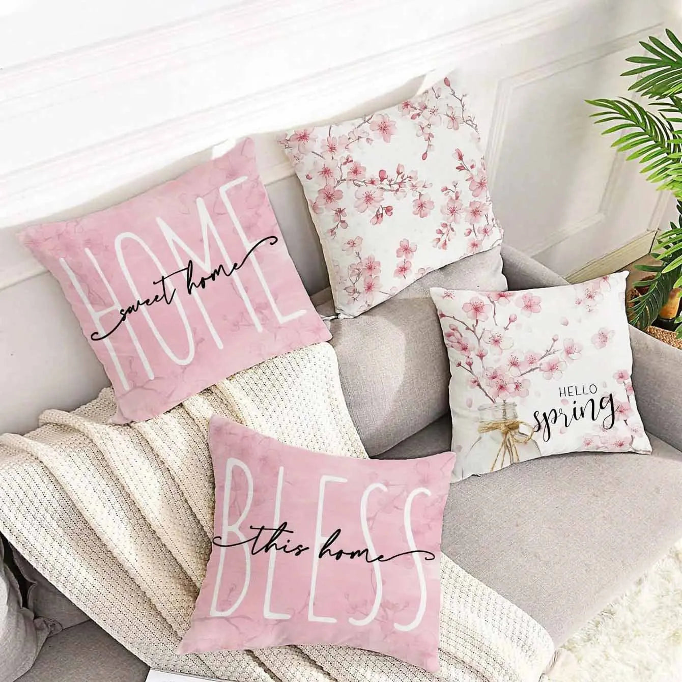 45cm square short velvet cushion cover with printed cherry blossom and letter design.