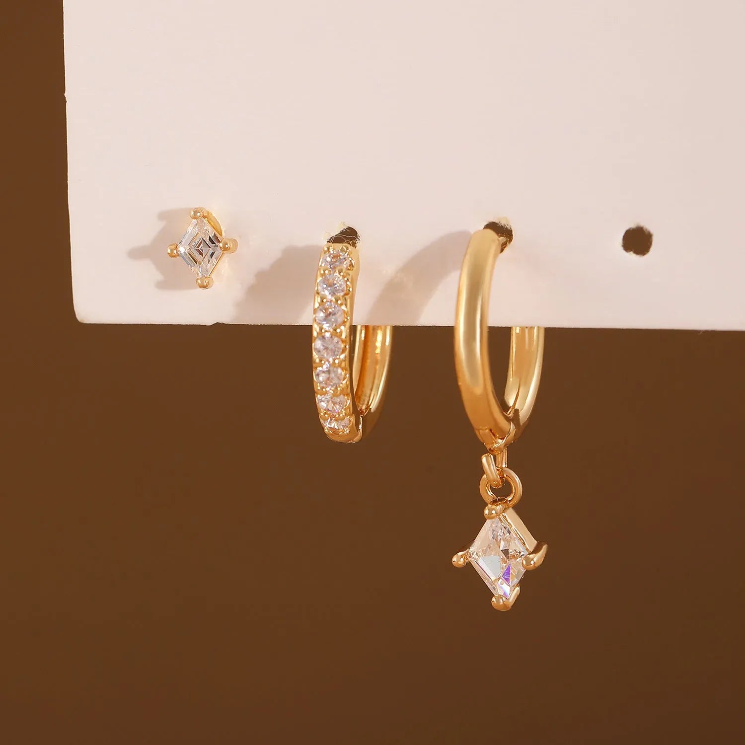 Geometric ladies jewellery three-piece set with zircon stones in gold and white colour options