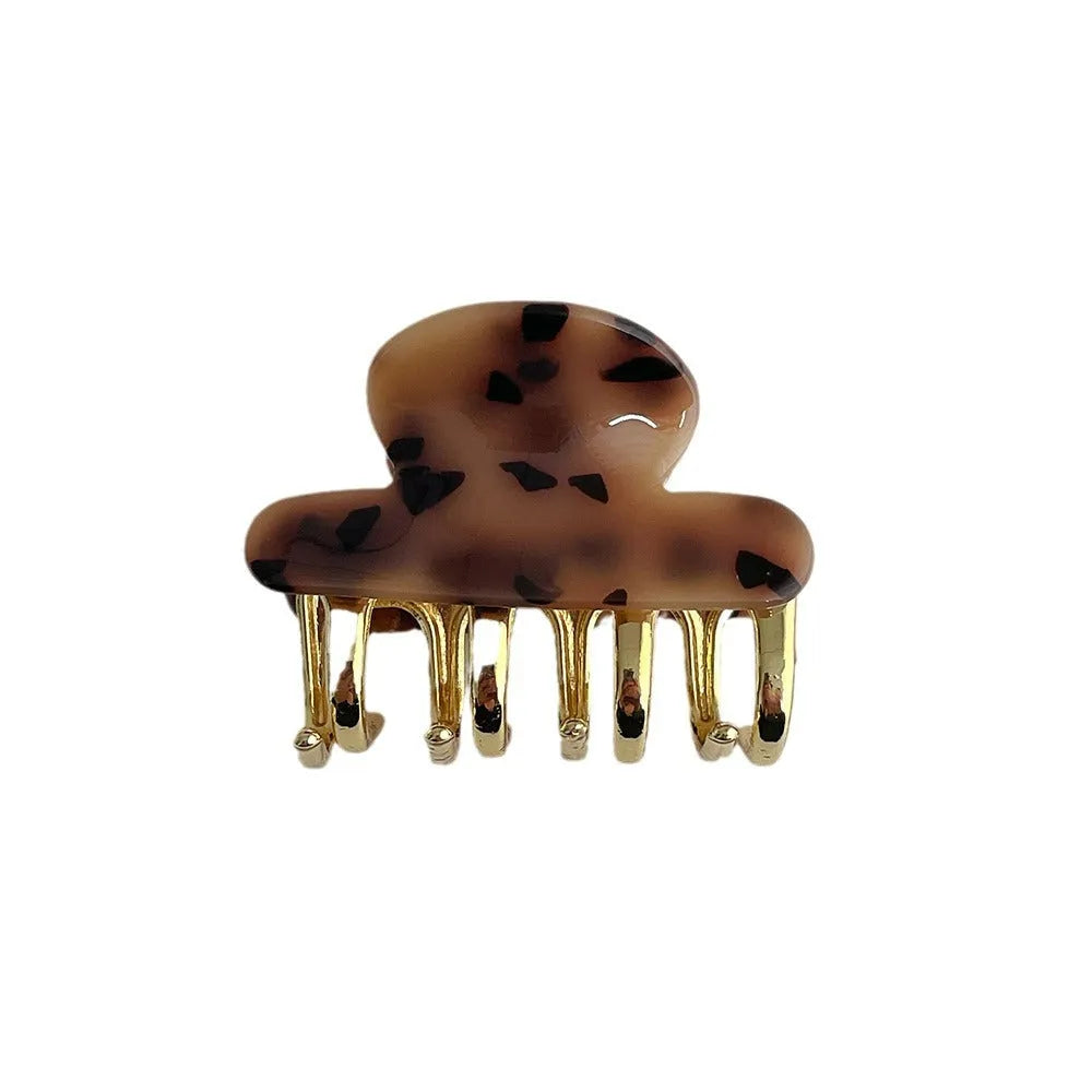 Women's retro acetate hair barrette with metal grip in leopard print pattern