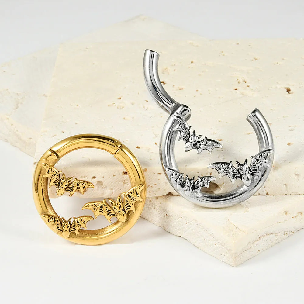 A pair of stainless steel fashion earrings with a shaped totem pattern, shown in one of fifteen available colour options.