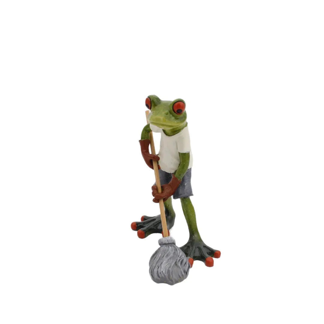 Synthetic resin pastoral style frog figurine home decoration ornament on a surface.