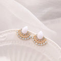 Women's retro fan-shaped silver needle earrings with rhinestone detailing on a geometric design.