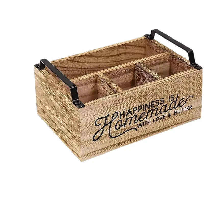 Wooden kitchen storage box with internal grid dividers for organising cutlery and utensils.