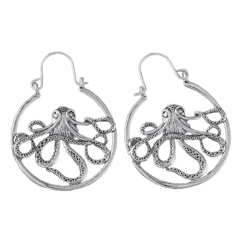 A pair of vintage-style octopus-shaped earrings in an antique silver colour.