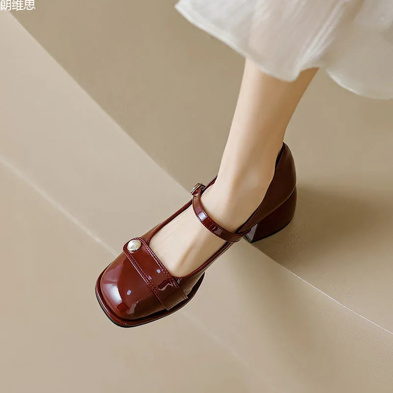 French style women's hiking shoes with chunky heel, square toe, and patent leather upper in apricot colour.