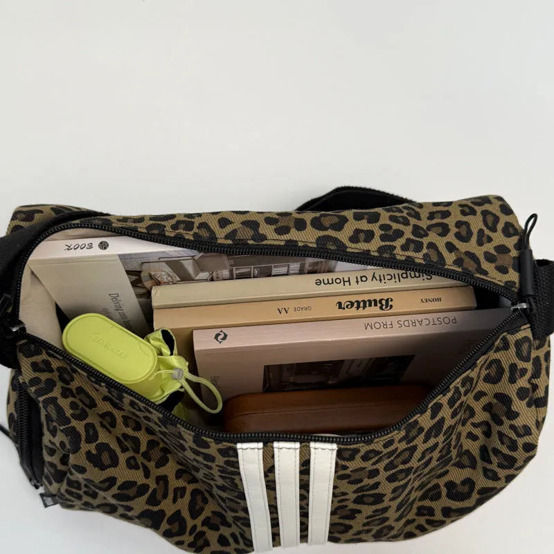 Leopard print sports messenger shoulder bag with stitching details