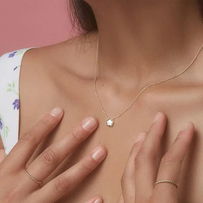 White mother of pearl shell flower necklace on O-chain in gold or silver finish