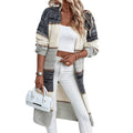 Grey striped women's knitted cardigan with loose fit and long sleeves