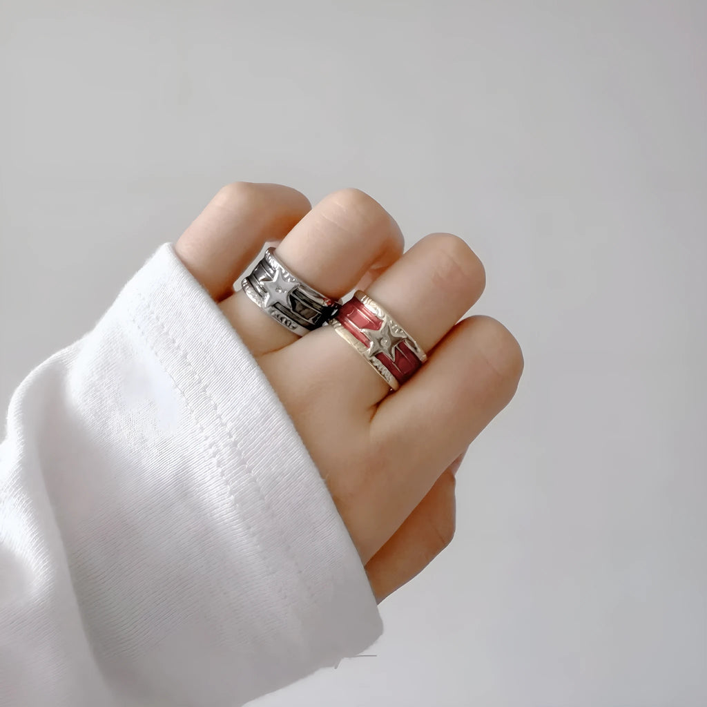Adjustable geometric women's ring with a retro distressed XINGX drop oil design in copper.