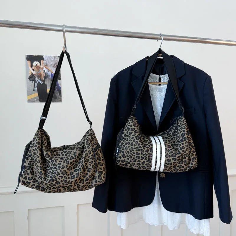 Leopard print sports messenger shoulder bag with stitching details